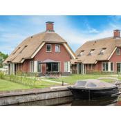 Atmospheric villa with nice garden, in a holiday park at the water in Friesland