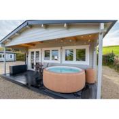 Luxury Log Cabin with Private Hot Tub & Sea Views