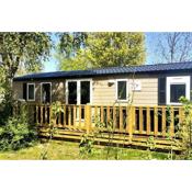 Modern holiday Chalet on lake side holiday park