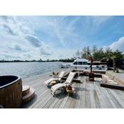 NEW - LITTLE IBIZA, on a lake near Amsterdam, with HOT TUB!