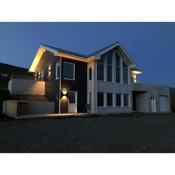 Villa in Akureyri with a hot tub and scenic view