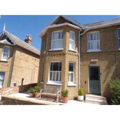 3 Bed CENTRAL village property, walk to BEACH, comfortable and beautifully presented, private and secure patio garden
