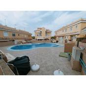 A delightful 2 bed family house with communal pool