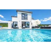 Amazing home in Donji Prolozac with Outdoor swimming pool and 4 Bedrooms