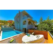 Amazing home in Trogir with WiFi, Heated swimming pool and 4 Bedrooms