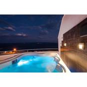 Apartment with sea view and hot tub, Magis Blue