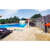 Beautiful apartment in Rab with Outdoor swimming pool and 1 Bedrooms