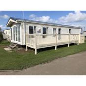Beautiful Caravan With Decking At California Cliffs In Scratby Ref 50052l