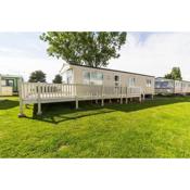 Brilliant caravan with decking at Seawick Holiday Park in Essex ref 27125S