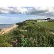 Captivating 2-Bed Beachfront Sea-View Norfolk home