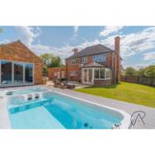 Charming Home in White Waltham with a Heated Pool, Hot Tub & Gym