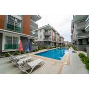 Comfortable Flat with Shared Pool Backyard and a Refreshing Balcony in Dalaman