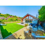 Cornwall New Build Bungalow in CORNISH ALPS # 4miles to the BEACH # 4miles to EDEN PROJECT # GARDEN Fully ENCL0SED# WHEEL CHAIR Access