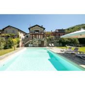 Country house with pool and outbuilding Fivizzano