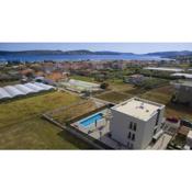 Family friendly apartments with a swimming pool Seget Donji, Trogir - 17869