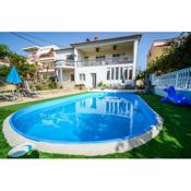 Family friendly apartments with a swimming pool Zadar - 17553