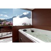 HelloChalet - Maison Francois - Ski Apartment with outdoor jacuzzi and terrace overlooking Matterhorn valley