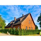 Historical holiday home in Mielenko 400 m from the sea