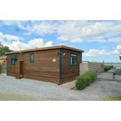 Lakeview 6 pers Holiday home Aurora with fenced garden, whirlpool and sauna