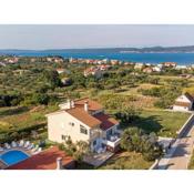 Large home with pool and outdoor kitchen,300 m distant from the sandy beach !