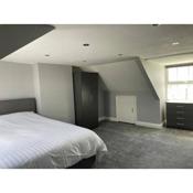 Large self contained 1 bedroom flat with parking.