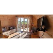 Luxury Glamping Pod with Hot Tub - The Herons Nest