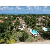 Luxury golf villa with private pool and service staff in exclusive resort near private beach