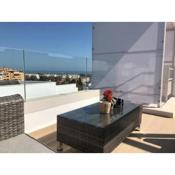 Modern penthouse with a large roof terrace close to the beach