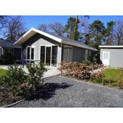Nice holiday home in a wooded location, in a holiday park on the Veluwe