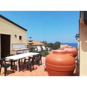 One bedroom house at Marina di Caronia 200 m away from the beach with sea view furnished terrace and wifi