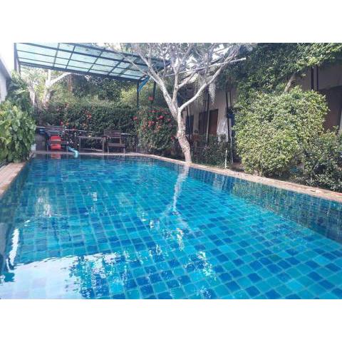 Quiet guest house with shared pool
