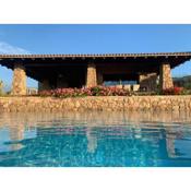 Santa Teresa Gallura, villa vista mare con ampio giardino, piscina riscaldata, WI-FI - IUN Q5020