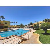 Seaside Apartment Corralejo : A cozy holiday home in a peaceful well located green complex