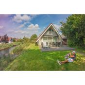 Sonnenhaus 6 pers house with sunny terrace at a typical dutch canal & by Lauwersmeer lake.
