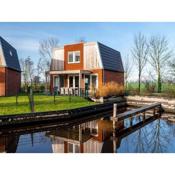 Spacious holiday home with outdoor spa, on a holiday park in Friesland