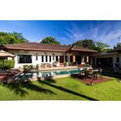 Spacious pool villa with garden and staff