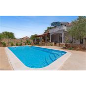 Stunning home in Oklaj with Outdoor swimming pool, WiFi and 3 Bedrooms