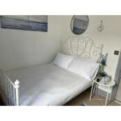 Stylish one bed apartment opposite station.
