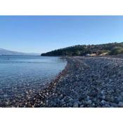 Three small beach hoses nearby the sea with magnificent view of Lesvos