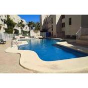 TurAlmeria - Mirador Del Cabo1 - Apartamento con 2 dormitorios, 2 baños, piscina y plaza de garaje con vistas al mar en Retamar - Almería